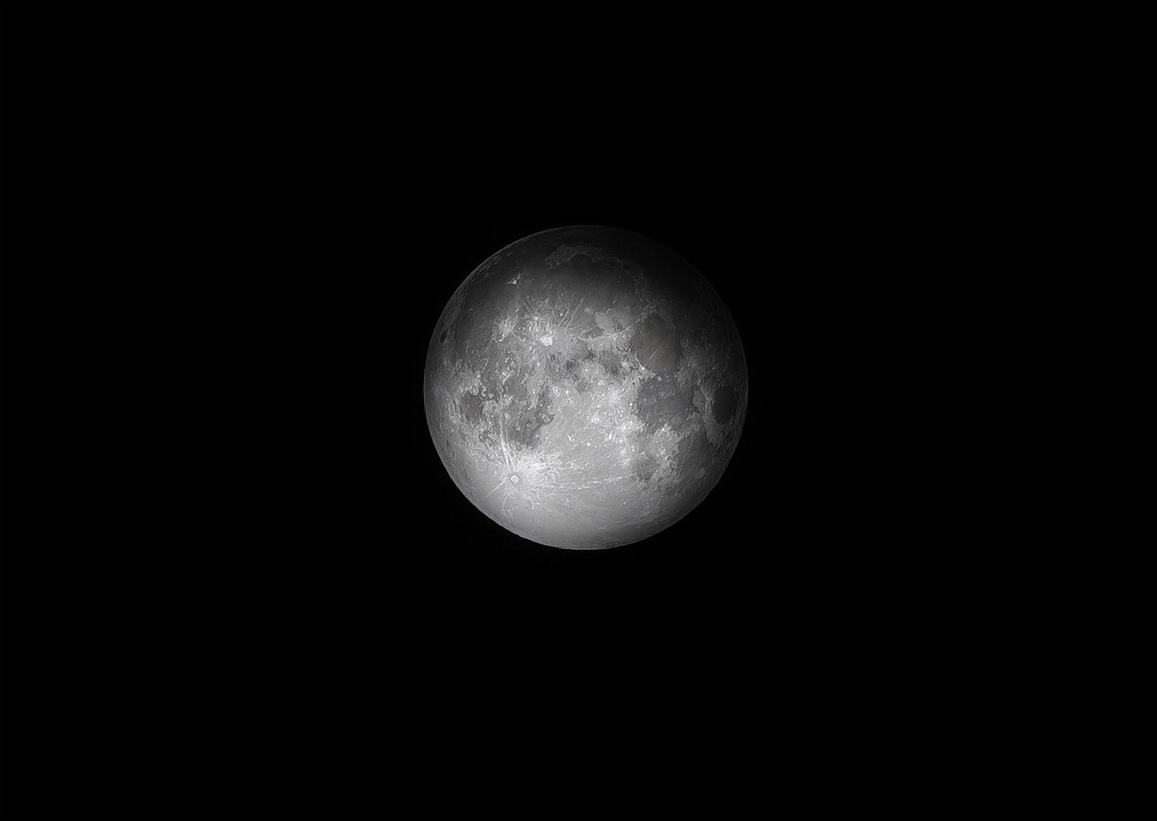 A clear view of the moon against a black background.