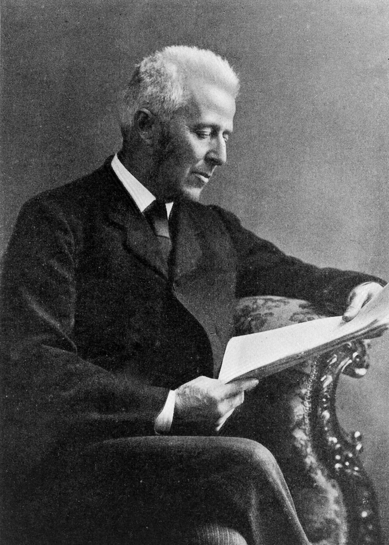 Portrait of Dr. Joseph Bell, the real-life doctor who inspired Sherlock Holmes, reading a document.