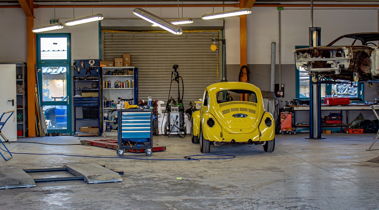 A car in a garage workshop