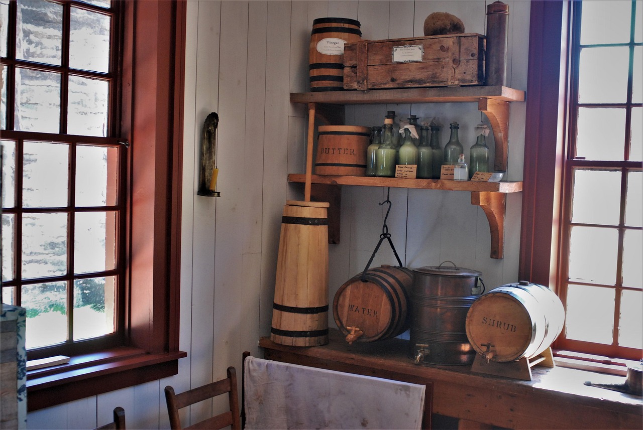 A rustic pantry with wooden barrels and jars, representing the concept of storing supplies.
