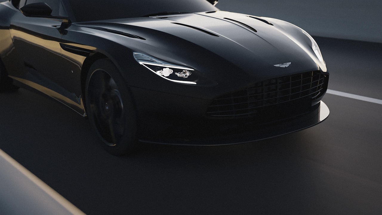 A close-up view of the front of a sleek black sports car.