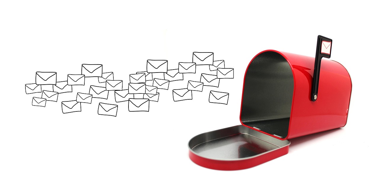 A red mailbox with a collection of hand-drawn envelope illustrations floating around it.